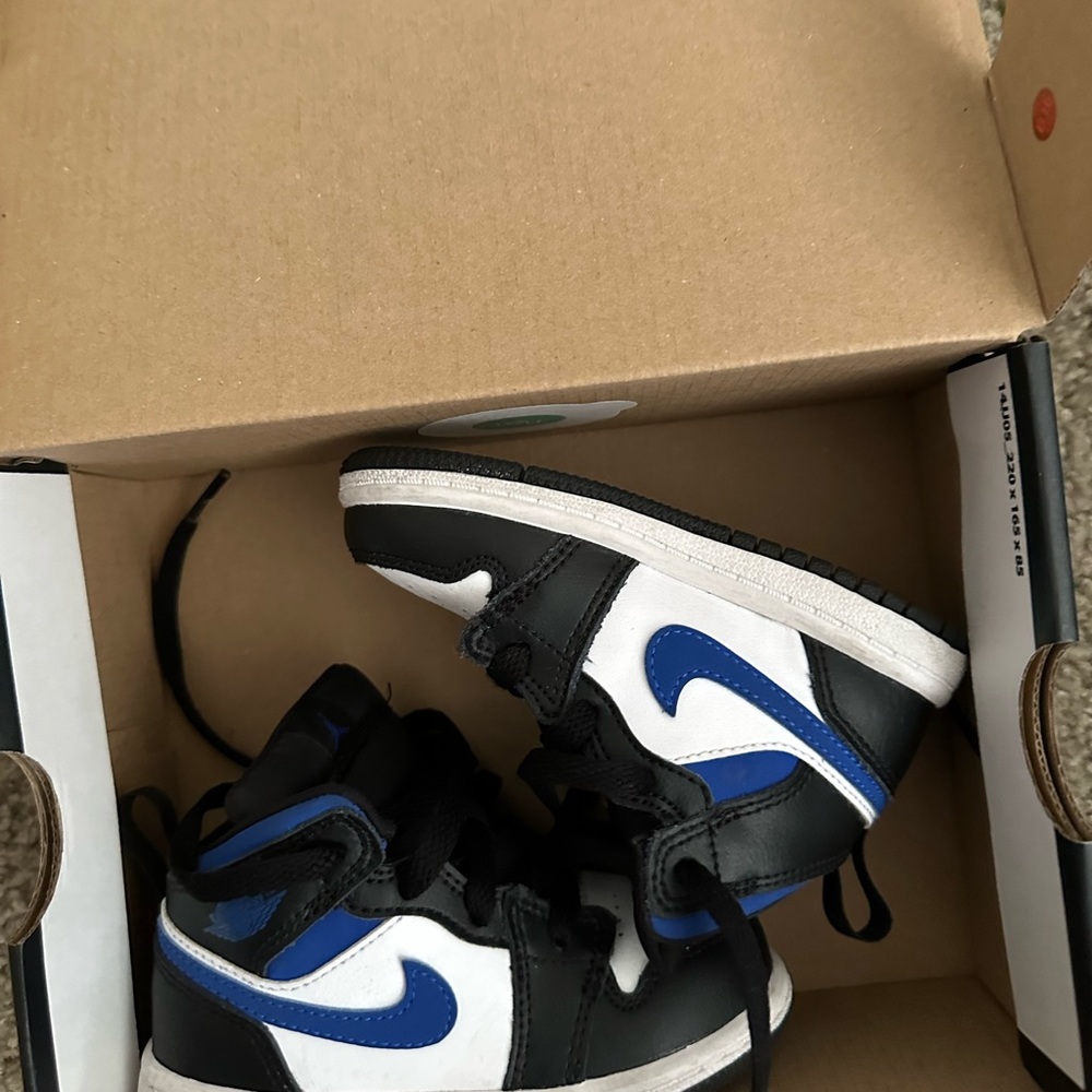 Blue and white and black Jordan ones
